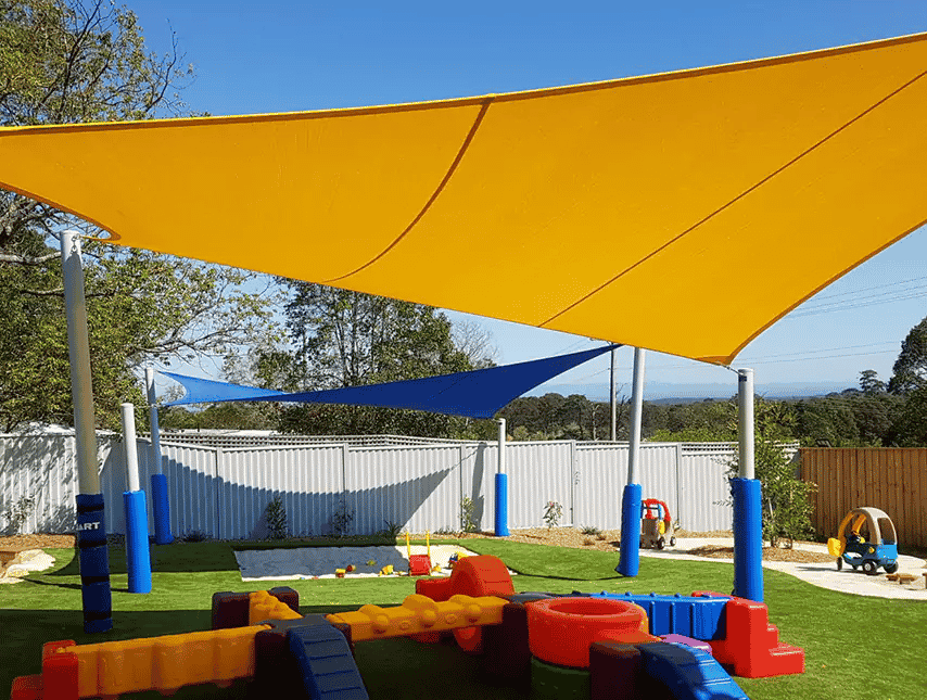image of a playground under custom made shade sails